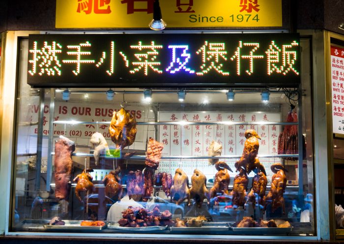 BBQ and roasted duck hanging in a restaurant window, Chinatown
